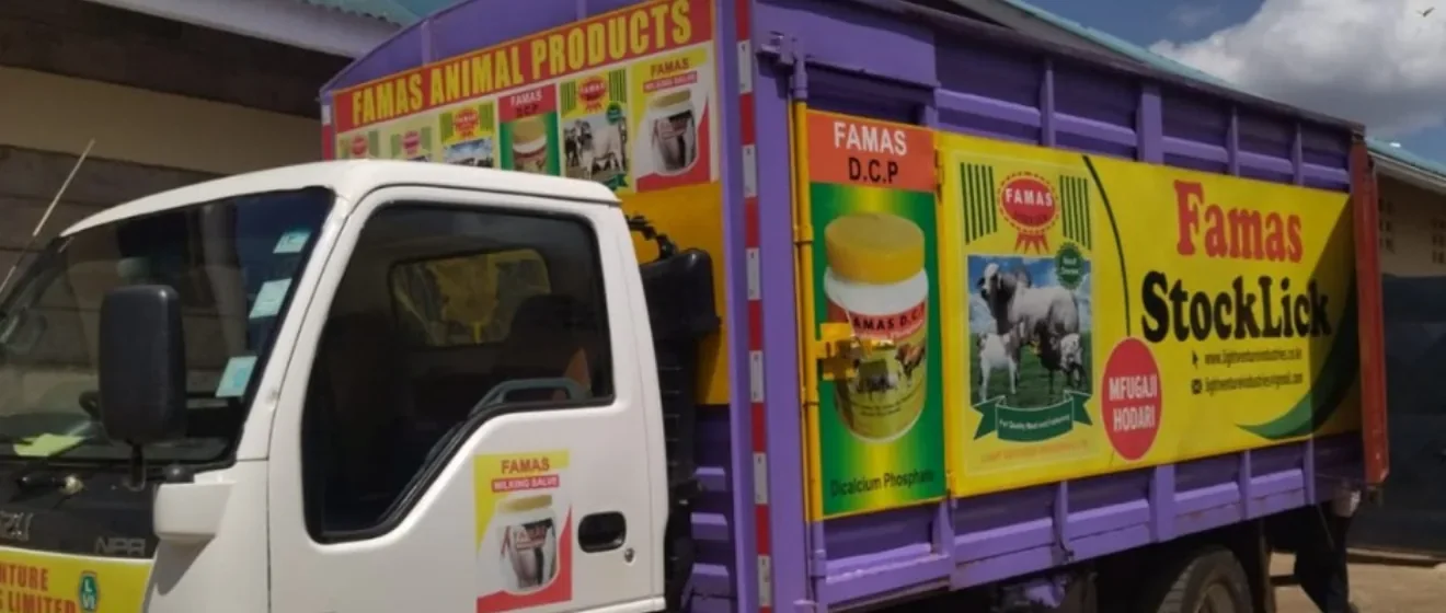 The FAMAS delivery lorry with FAMAS Stocklick and DCP artwork on its side